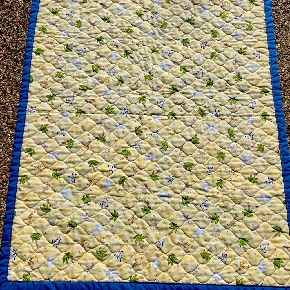 Quilt with animal print, Size 34” x 43”